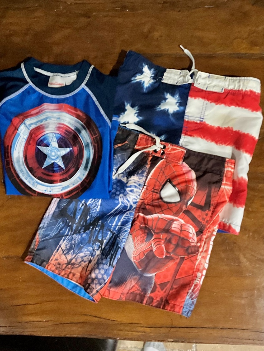 Boys lot of clothing: Capt America Rash Guard T, Flag & Spider-Man Swim Trunks